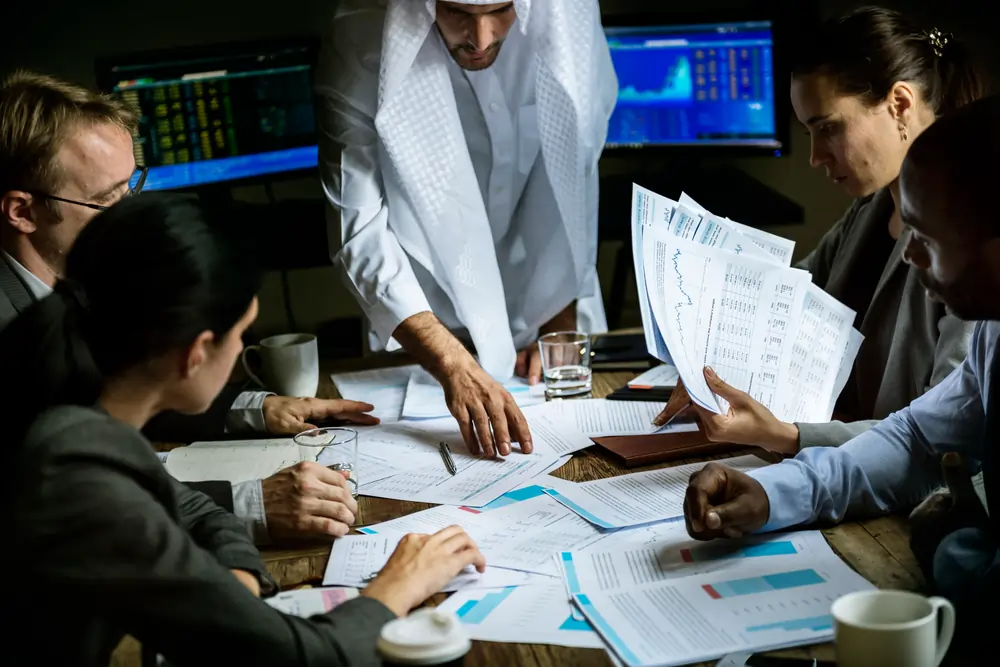 SEO agency office in Dubai with team analyzing website performance metrics